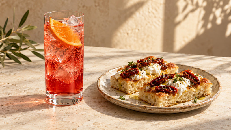 Bitter e tonica: focaccia con formaggio e pomodori con pomodori sott'olio Minnelea