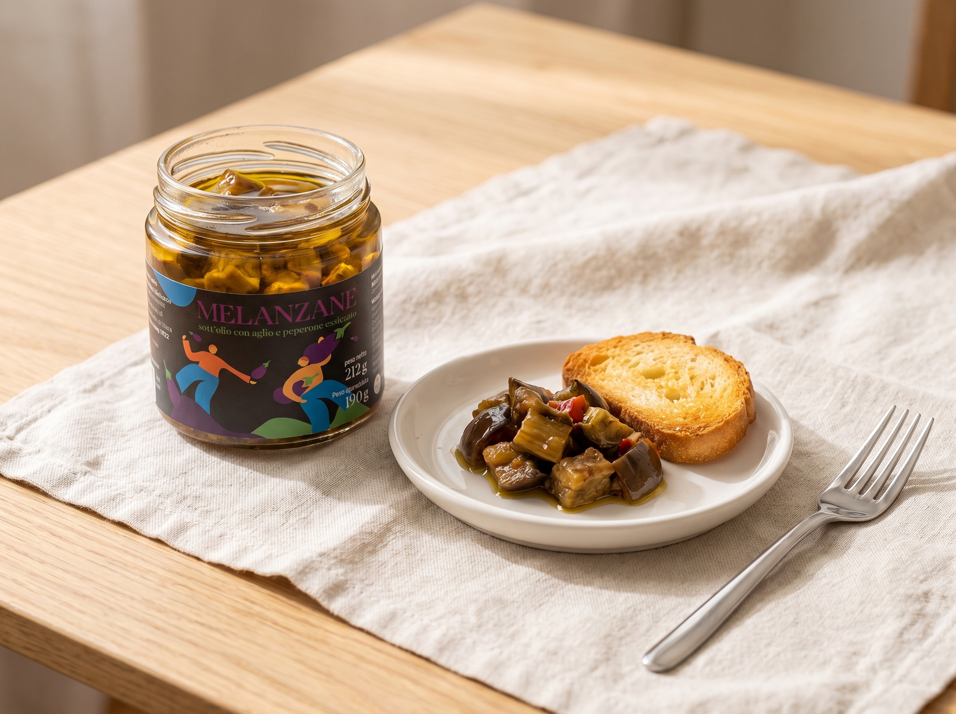 Melanzane sott'olio EVO Minnelea nel vasetto aperto servite con crostini