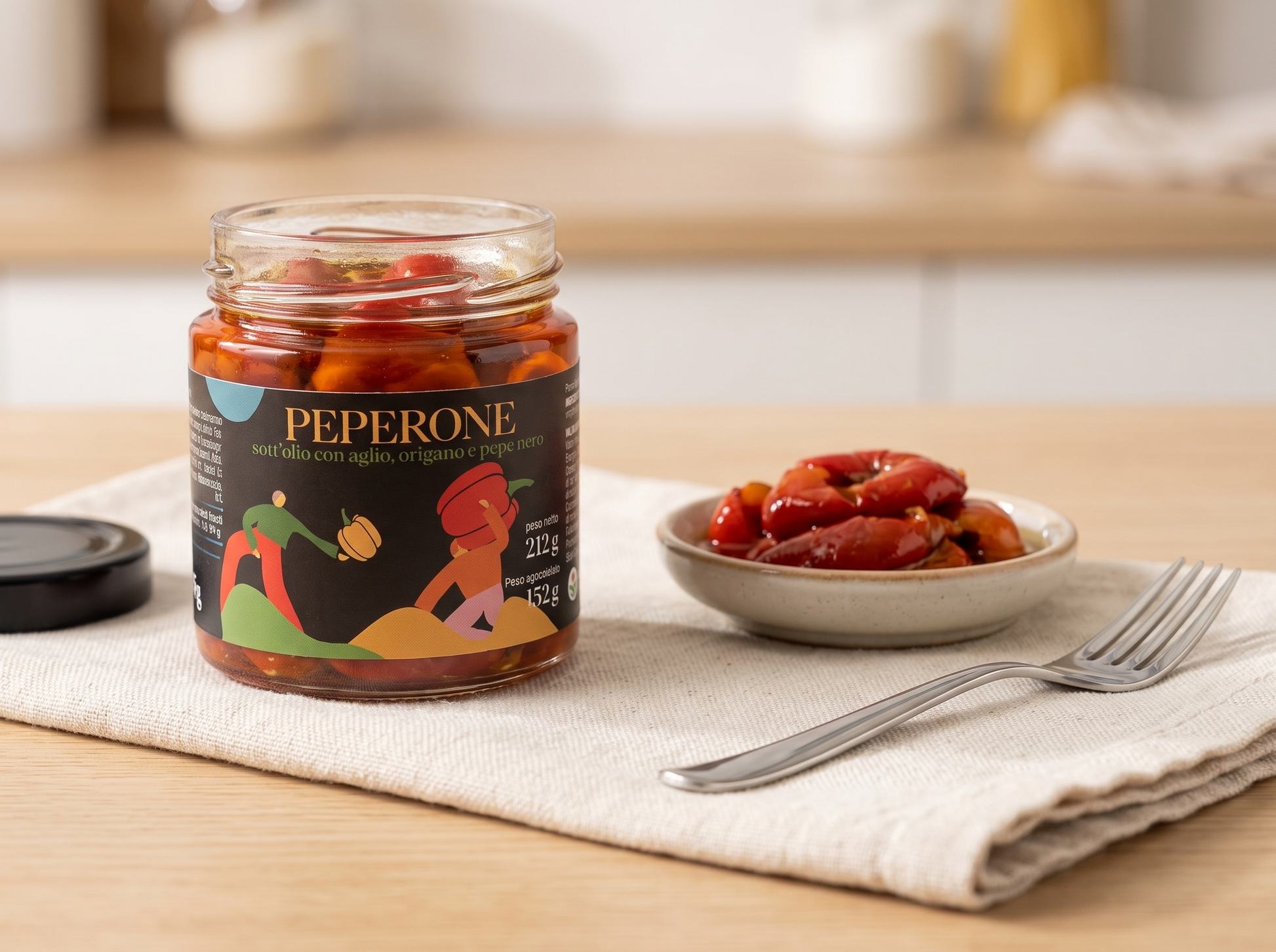 Peperoni sott'olio Minnelea nel vasetto aperto con ciotolina di antipasto